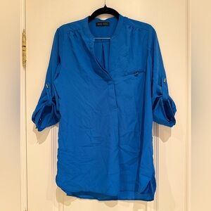 Elegant Blue Blouse with Roll-Up Sleeves
